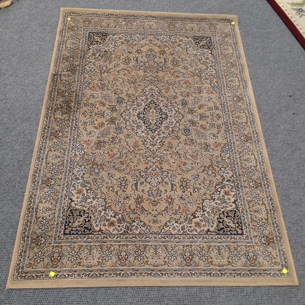 Lot 154 - Persian style machine made with light brown...