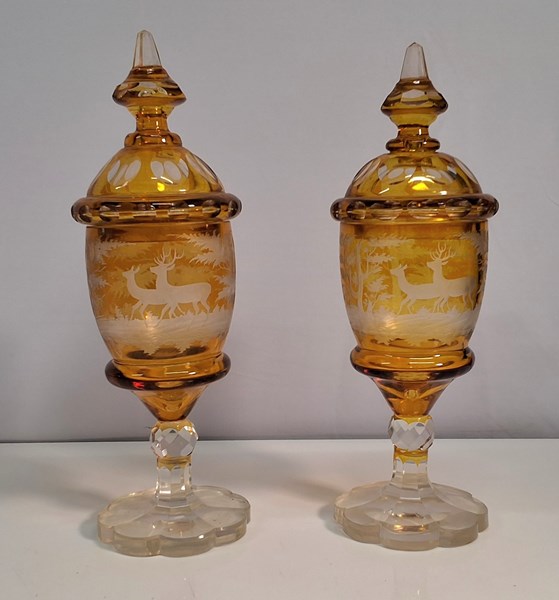 Lot 1362 - A PAIR OF BOHEMIAN AMBER VASES