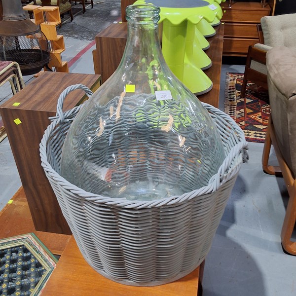 Lot 296 - CARBOY IN BASKET