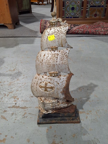 Lot 49 - CAST IRON DOOR STOP