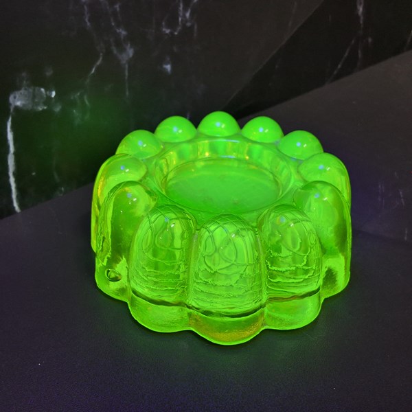 Lot 1177 - URANIUM GLASS PIANO CASTOR