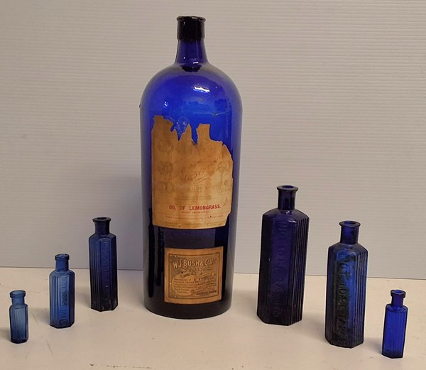 Lot 1313 - BLUE GLASS APOTHECARY BOTTLES