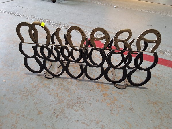 Lot 233 - HORSE SHOE WINE RACK