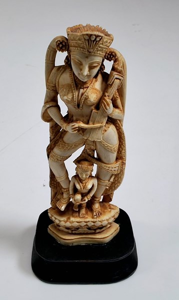 Lot 1065 - CARVED FIGURE