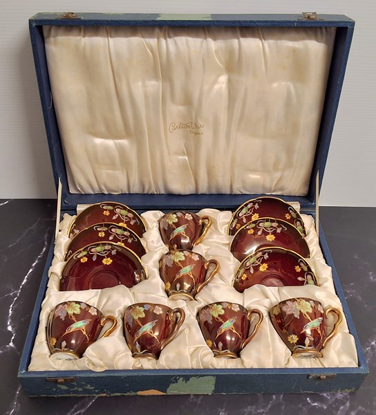 Lot 1269 - CARLTONWARE DEMITASSE SET