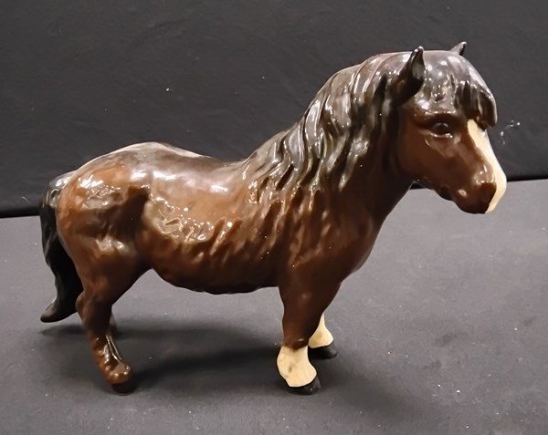 Lot 1145 - ROYAL DOULTON HORSE