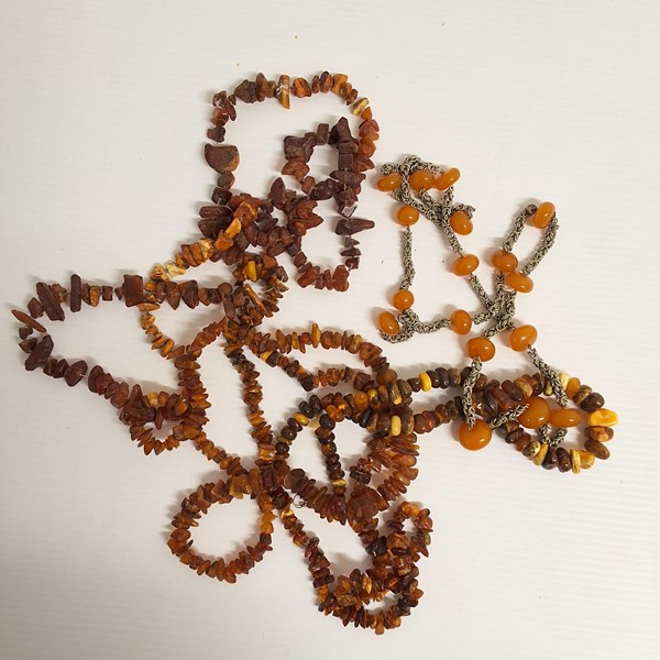 Lot 1034 - AMBER NECKLACES