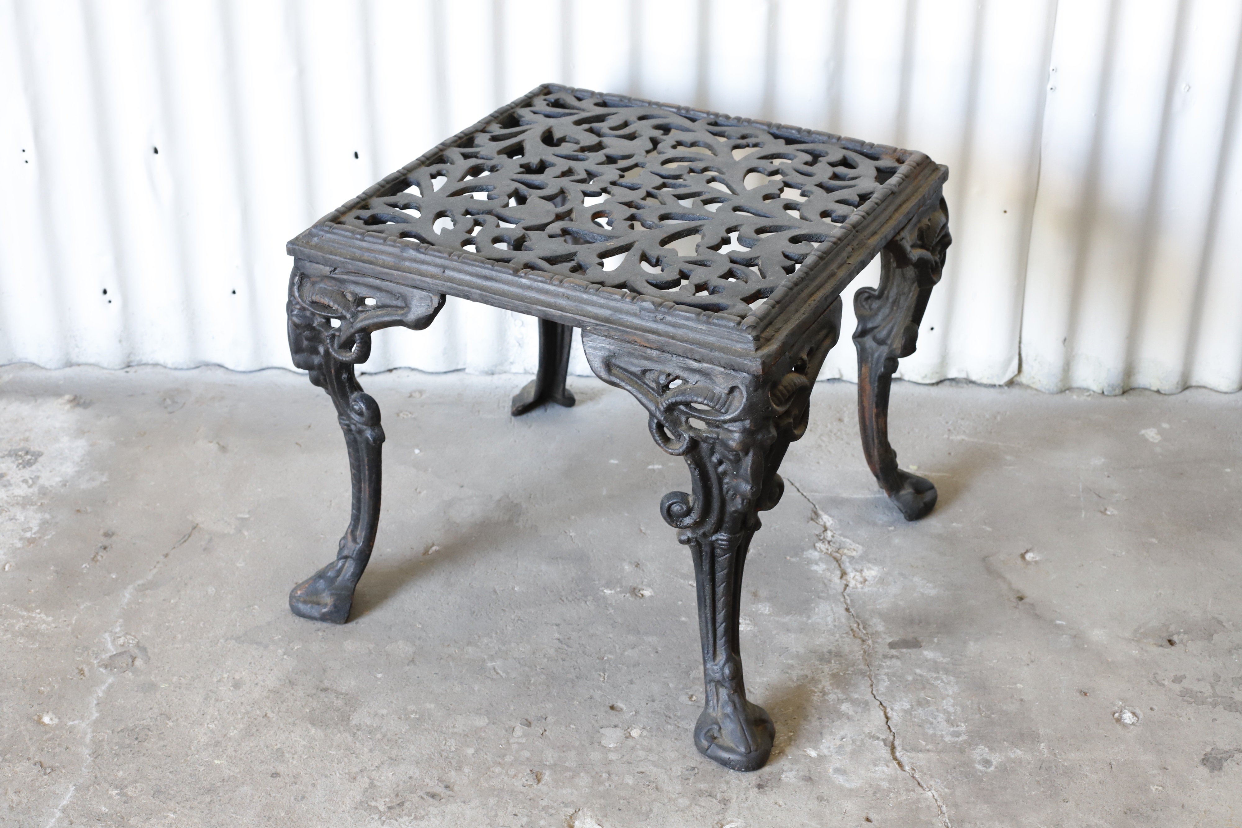 Lot 47 - CAST IRON SIDE TABLE