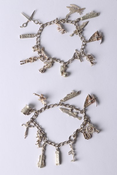 Lot 1057 - SILVER CHARMS