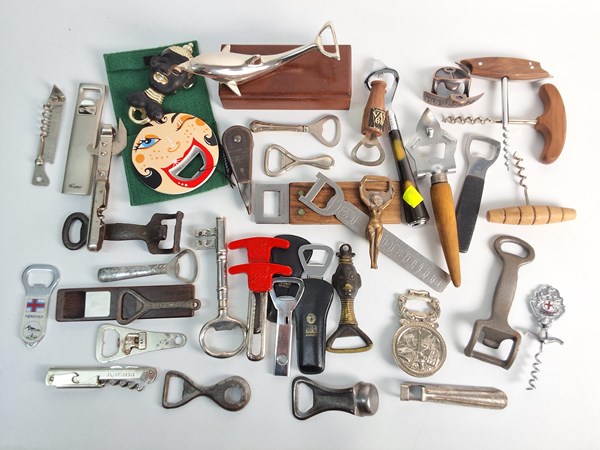 Lot 1250 - A COLLECTION OF BOTTLE OPENERS