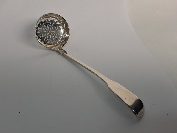 Lot 1087 - SILVER SIFTER LADLE