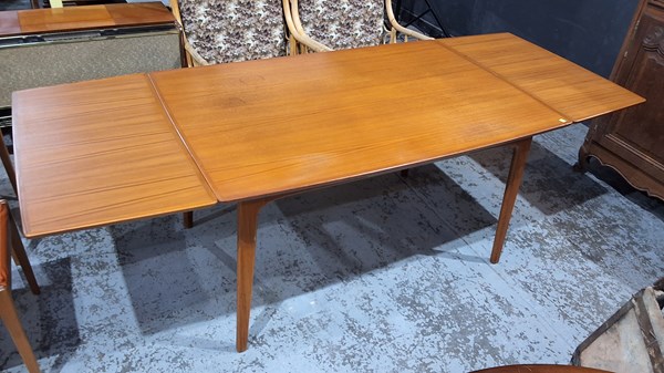 Lot 253 - TEAK DINING TABLE