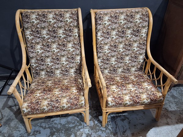 Lot 145 - TWO CANE ARMCHAIRS