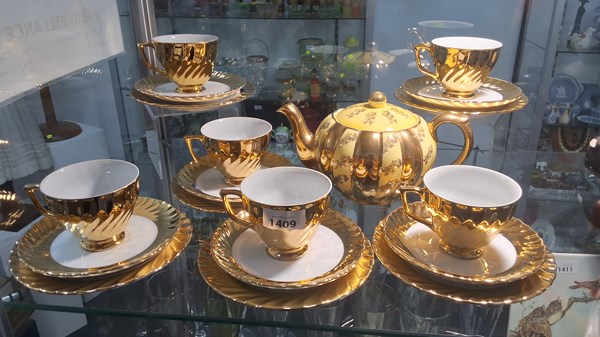 Lot 1409 - GILT TRIOS