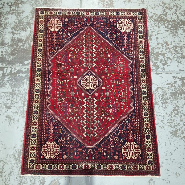 Lot 101 - PERSIAN RUG