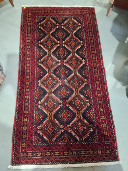 Lot 205 - PERSIAN RUG