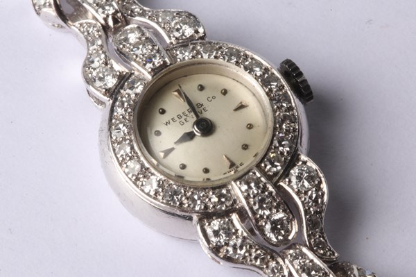 Lot 1046 - PLATINUM & DIAMOND WATCH