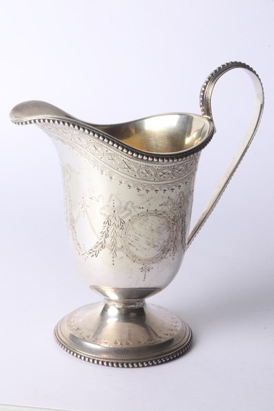 Lot 1039 - SILVER MILK JUG