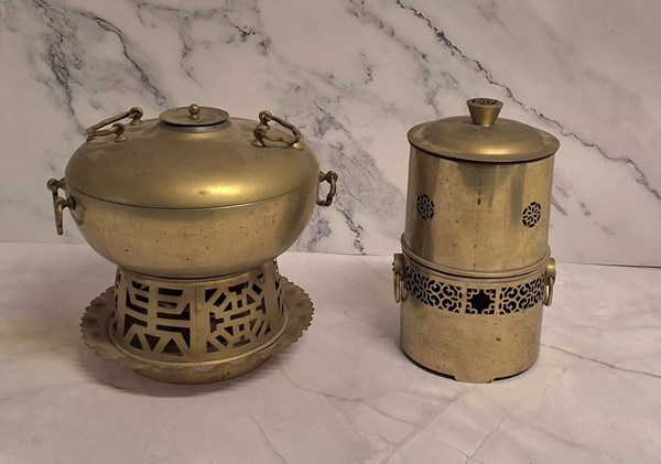 Lot 1222 - TWO BRASS WARMERS