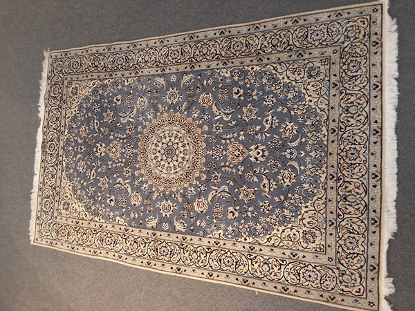 Lot 110 - PERSIAN RUG