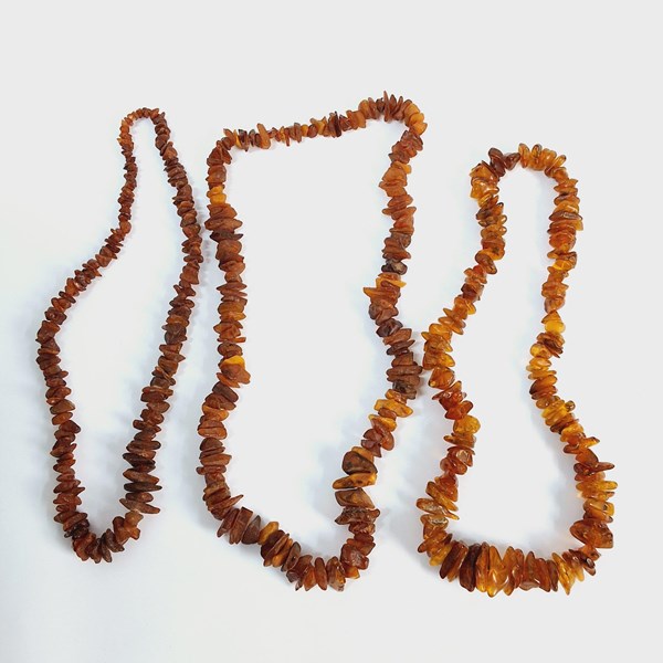 Lot 1036 - AMBER NECKLACES