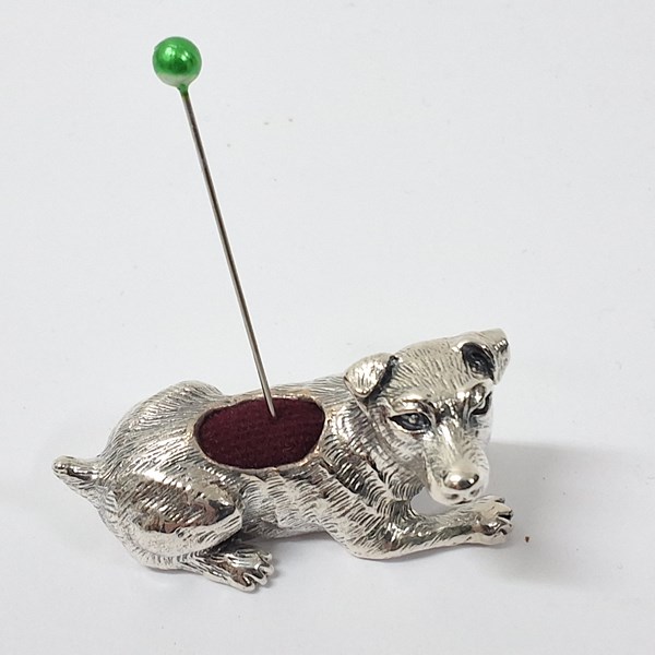 Lot 1059 - SILVER DOG PINCUSHION