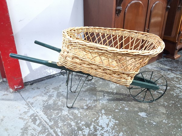 Lot 70 - CANE WHEELBARROW