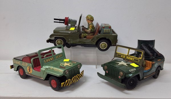 Lot 1086 - TIN TOY JEEPS