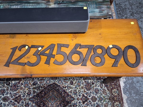 Lot 318 - CAST IRON NUMBERS