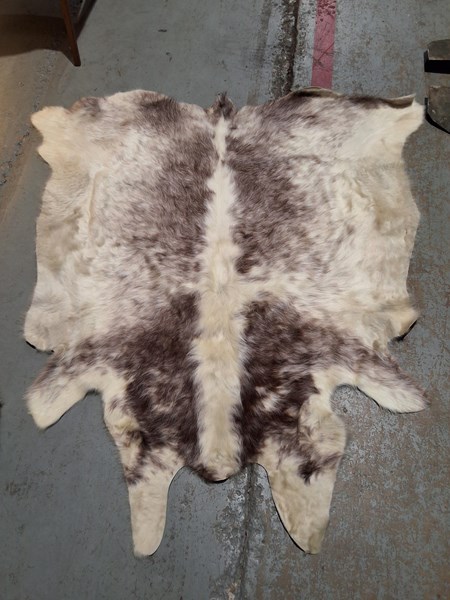 Lot 84 - COWHIDE RUG