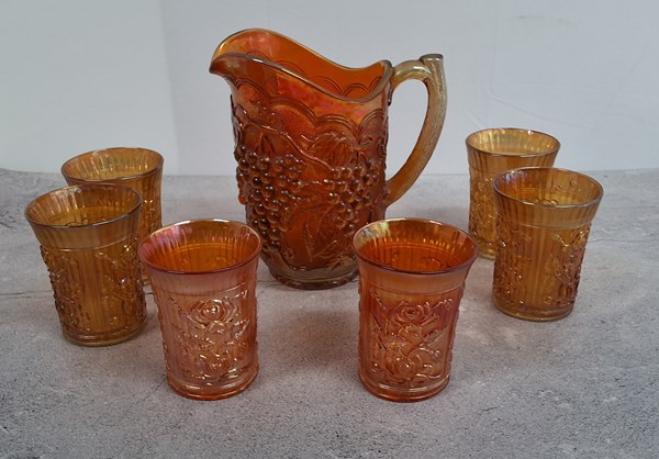 Lot 1516 - CARNIVAL GLASS JUG & GLASSES