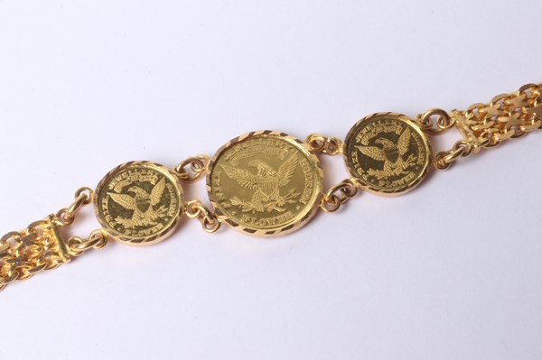 Lot 1028 - GOLD BRACELET