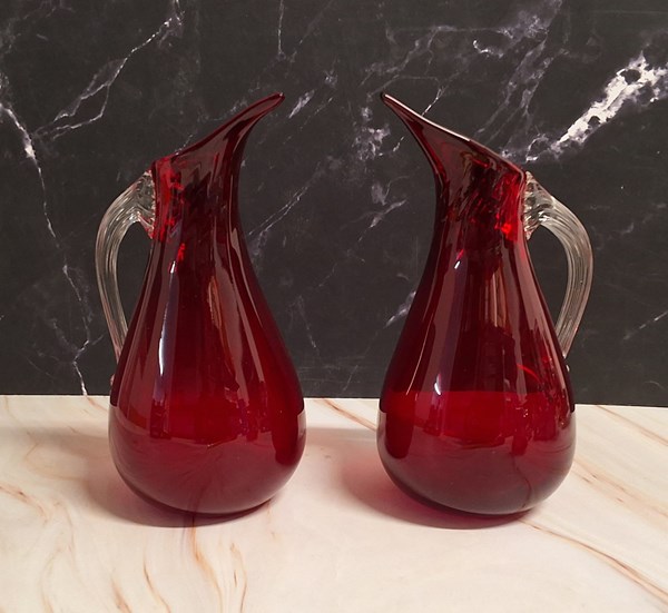 Lot 1209 - RUBY GLASS JUGS