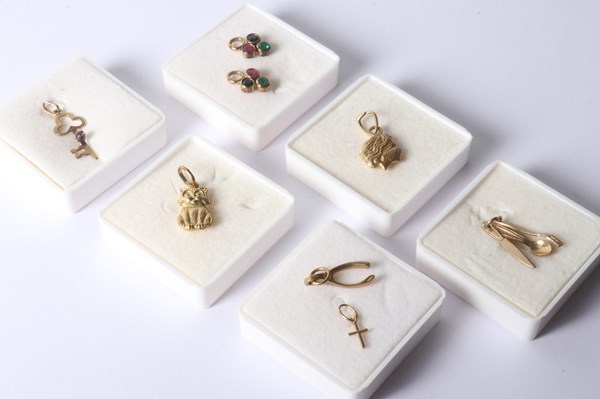 Lot 1055 - GOLD CHARMS