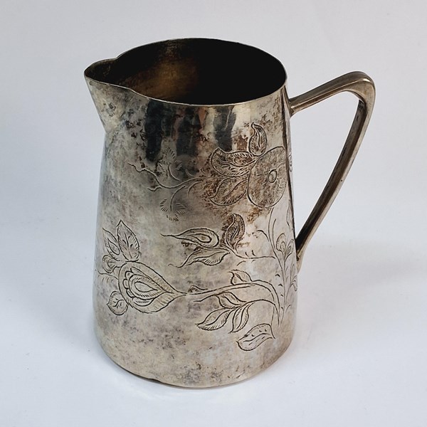 Lot 1045 - STERLING SILVER JUG