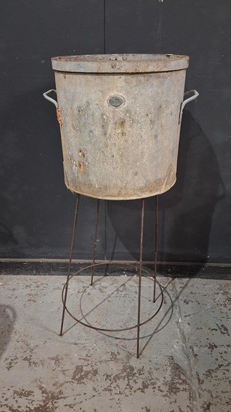 Lot 57 - GALVANISED POT AND STAND