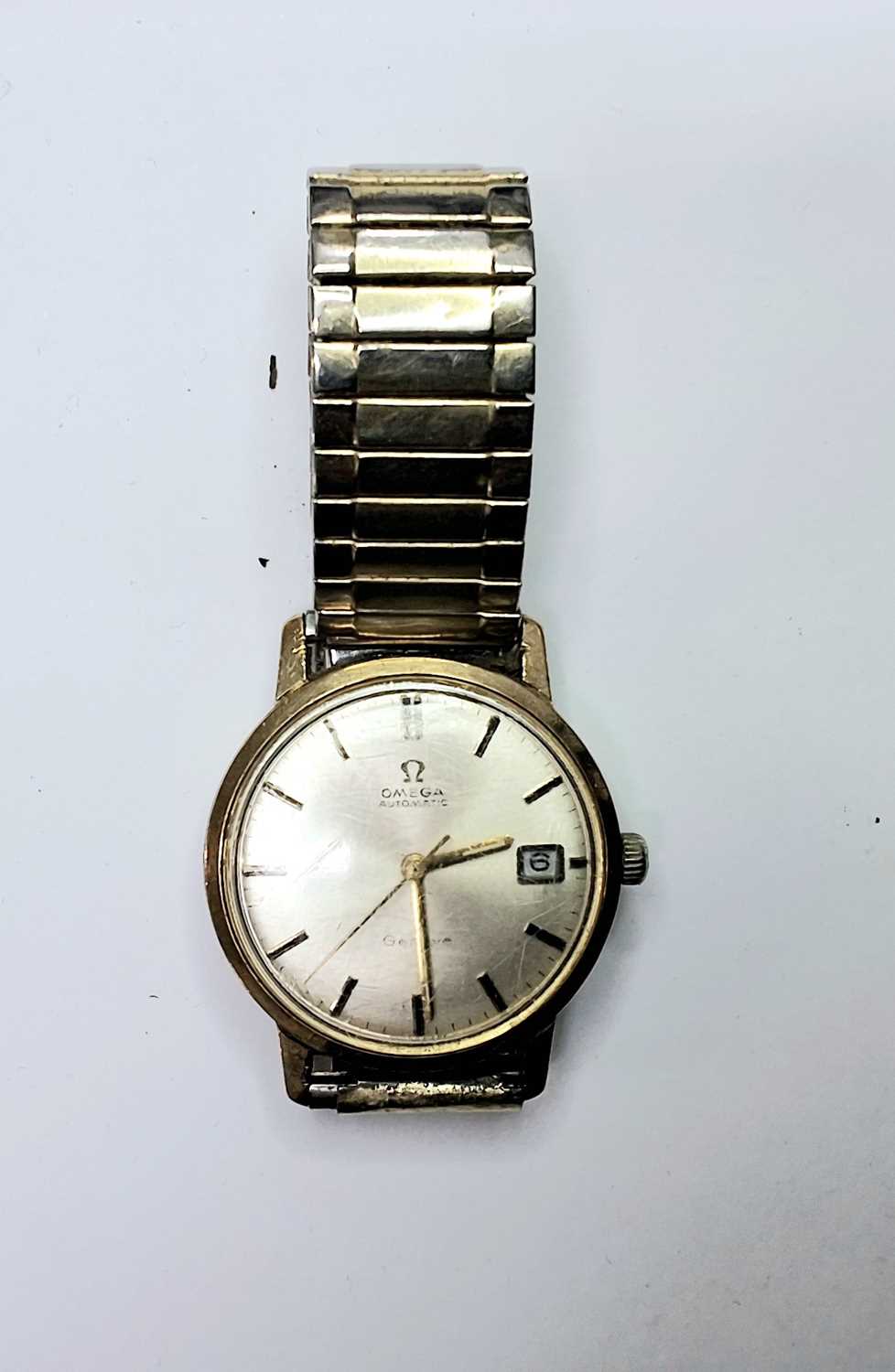 Lot 1034 - GOLD OMEGA WATCH