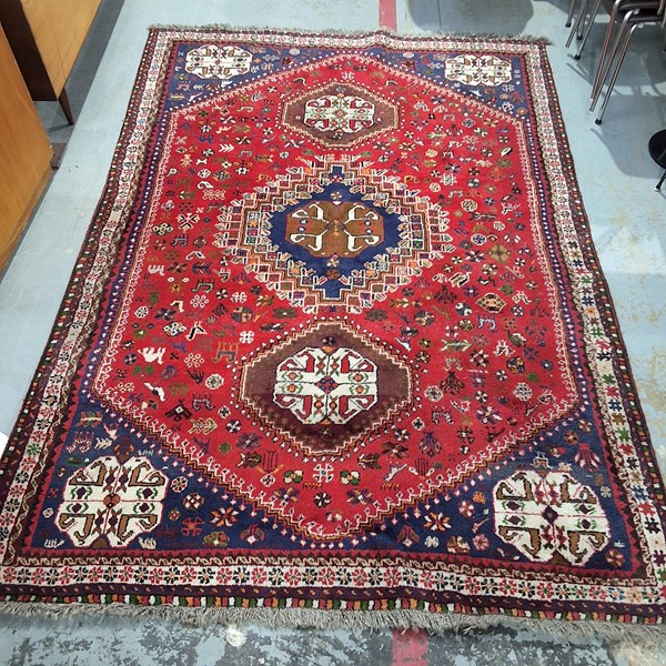 Lot 105 - PERSIAN RUG