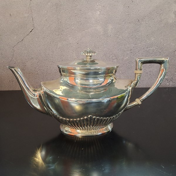 Lot 1048 - STERLING SILVER TEAPOT