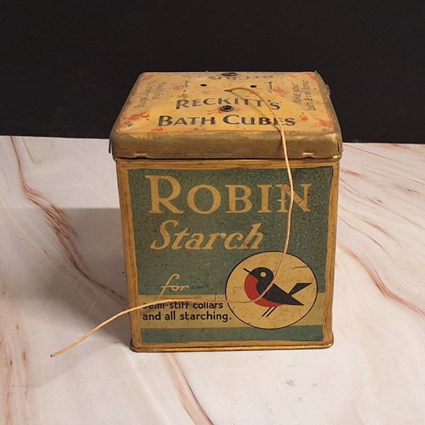 Lot 1176 - STRING TIN