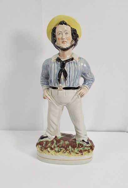 Lot 1011 - STAFFORDSHIRE FIGURE