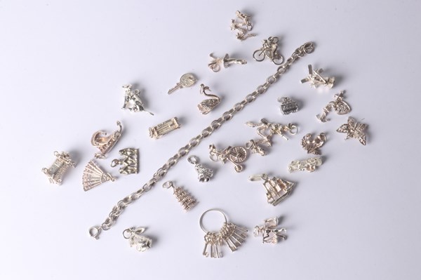 Lot 1047 - SILVER CHARMS