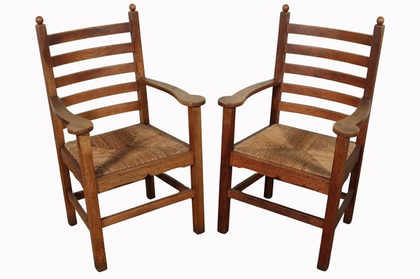 Lot 140 - PAIR OF OAK ARMCHAIRS