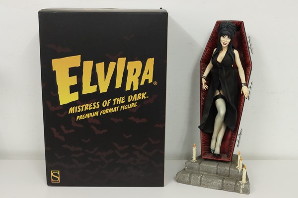 Lot 1240 - ELVIRA FIGURE