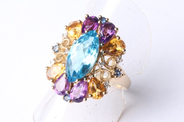 Lot 1053 - GOLD GEMSTONE RING