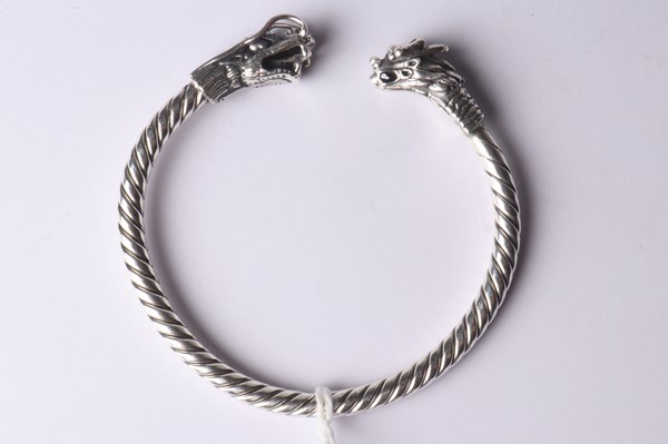 Lot 1077 - SILVER BANGLE