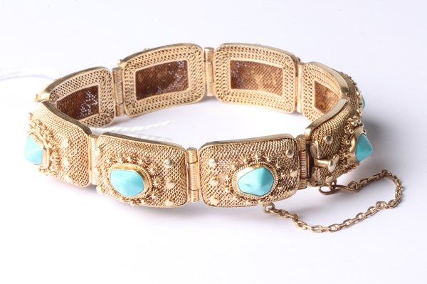 Lot 1056 - GILT TURQUOISE BRACELET