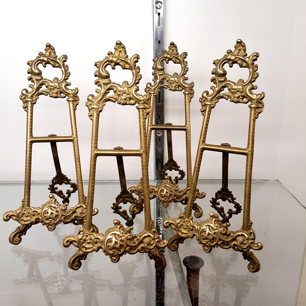 Lot 1299 - BRASS EASELS