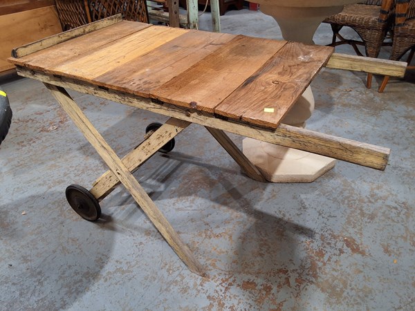 Lot 495 - POTTING TROLLEY