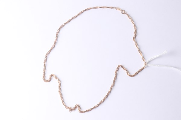 Lot 1002 - GOLD NECKLACE